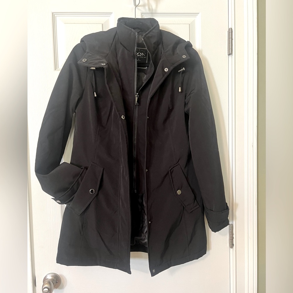 Black all weather coat with hood, inside zipper and snap pockets.
